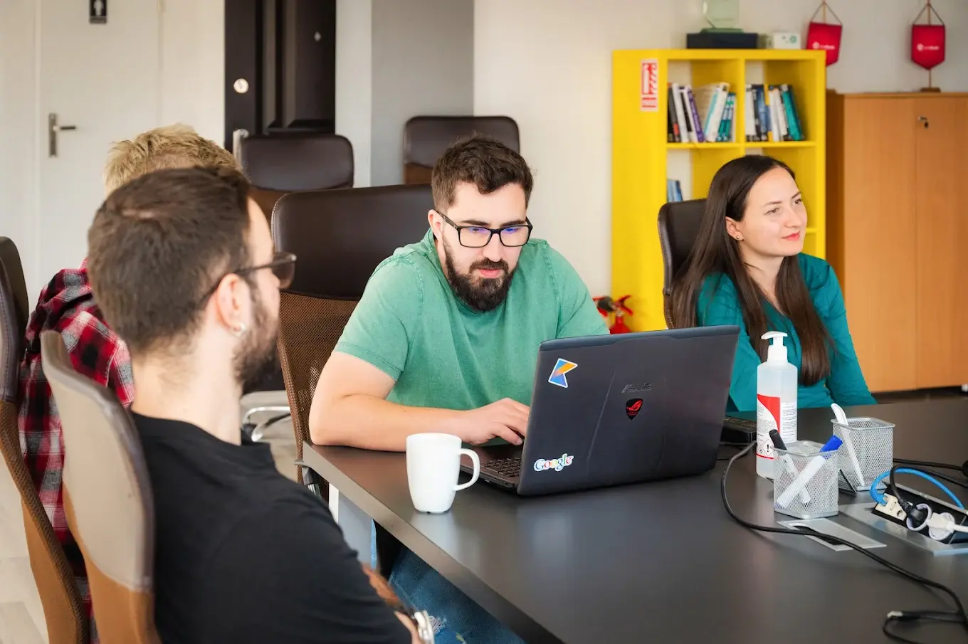 Wirtek project team collaborating on the EVA platform